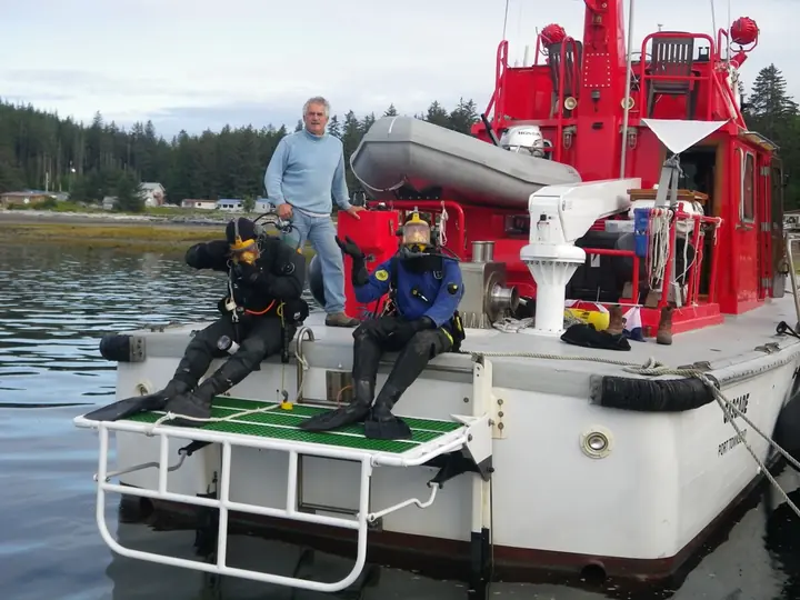 Divers and crew staged on CASCADE stern platform