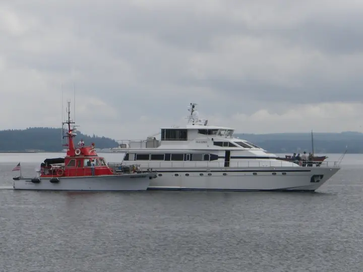 CASCADE alongside a larger passenger vessel